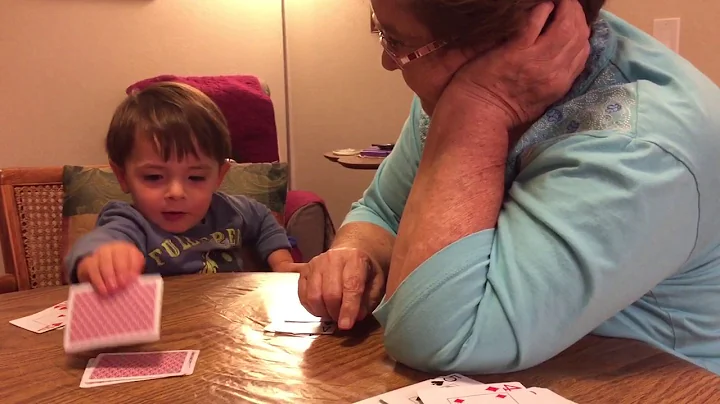 Xander learns to play cards from Great Grandma Z
