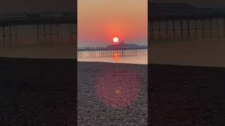 Golden-Orange Sunrise over Brighton Pier.