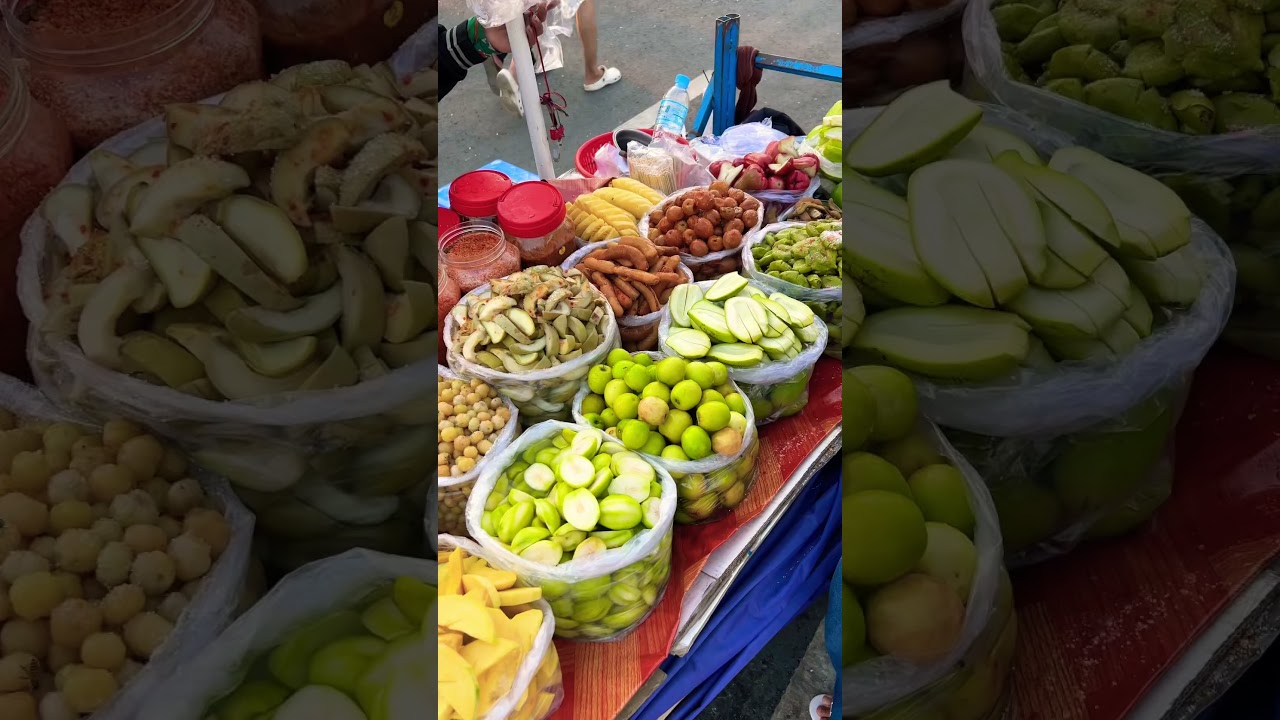 Cheap and Fresh sour and spicy fruits on Cambodia streets 