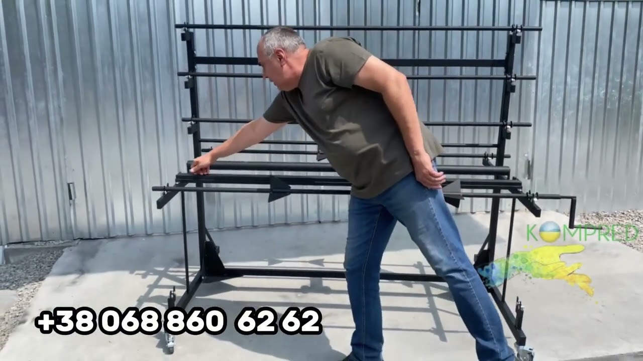 Розмотувач для рулонних матеріалів з лічильником та різаком