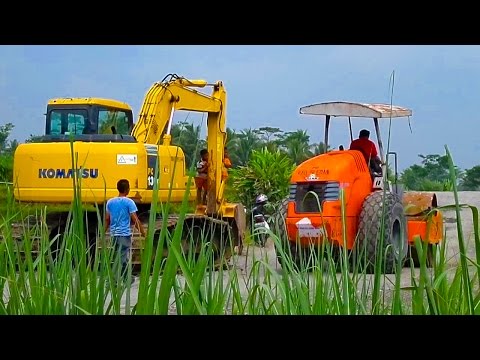 Thumbnail for Compactor hamm 3410 komatsu pc130f walk after unloading to project site