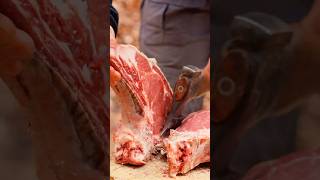 Splitting a Dry Aged Tomahawk with an Axe | Bushcraft Butchery