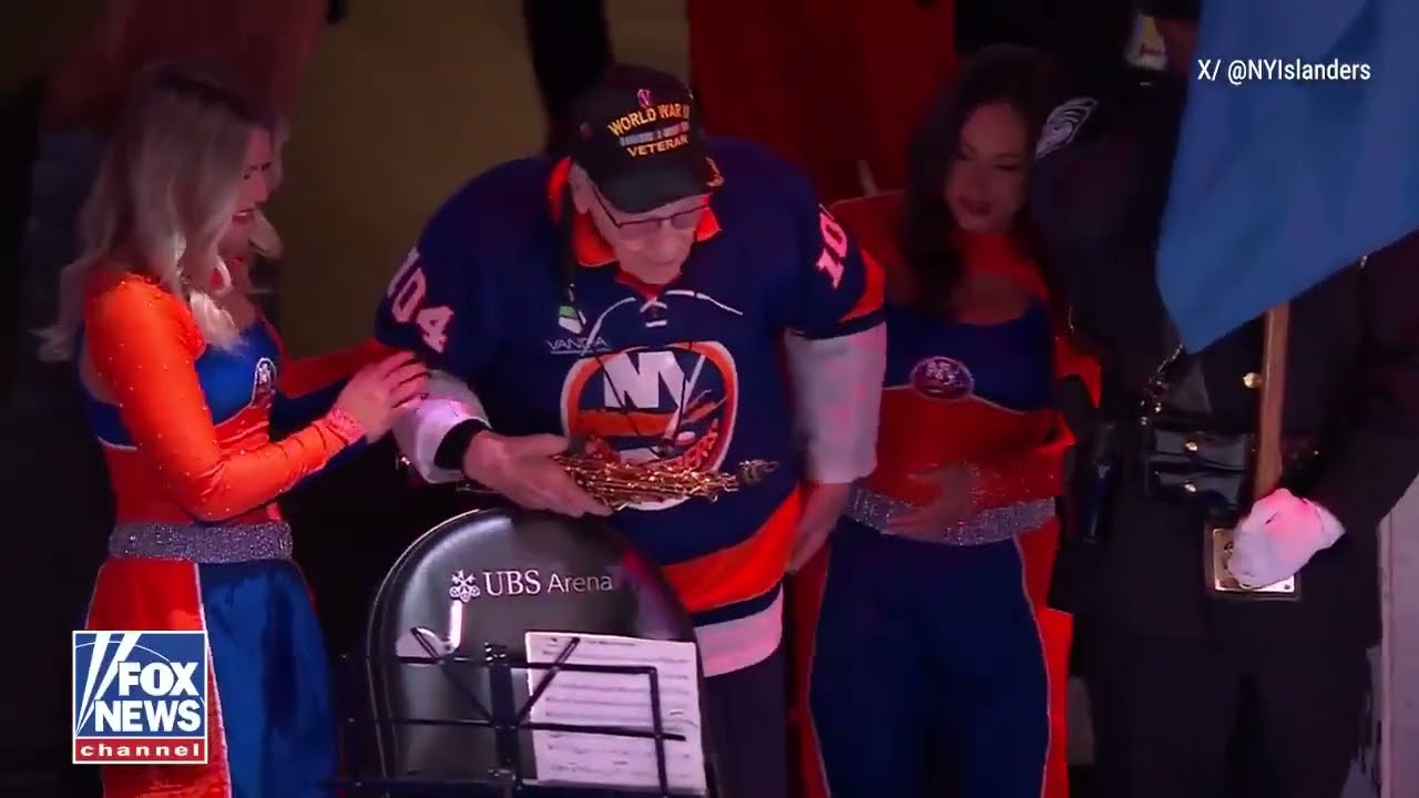 104 year old WWII vet plays national anthem on saxophone at New York Rangers game