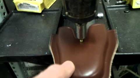 Kick press to set snaps on leather