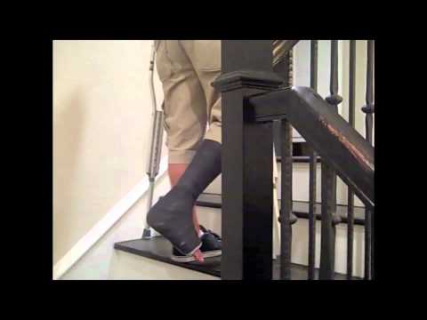 Walking up and down the stairs on crutches - YouTube