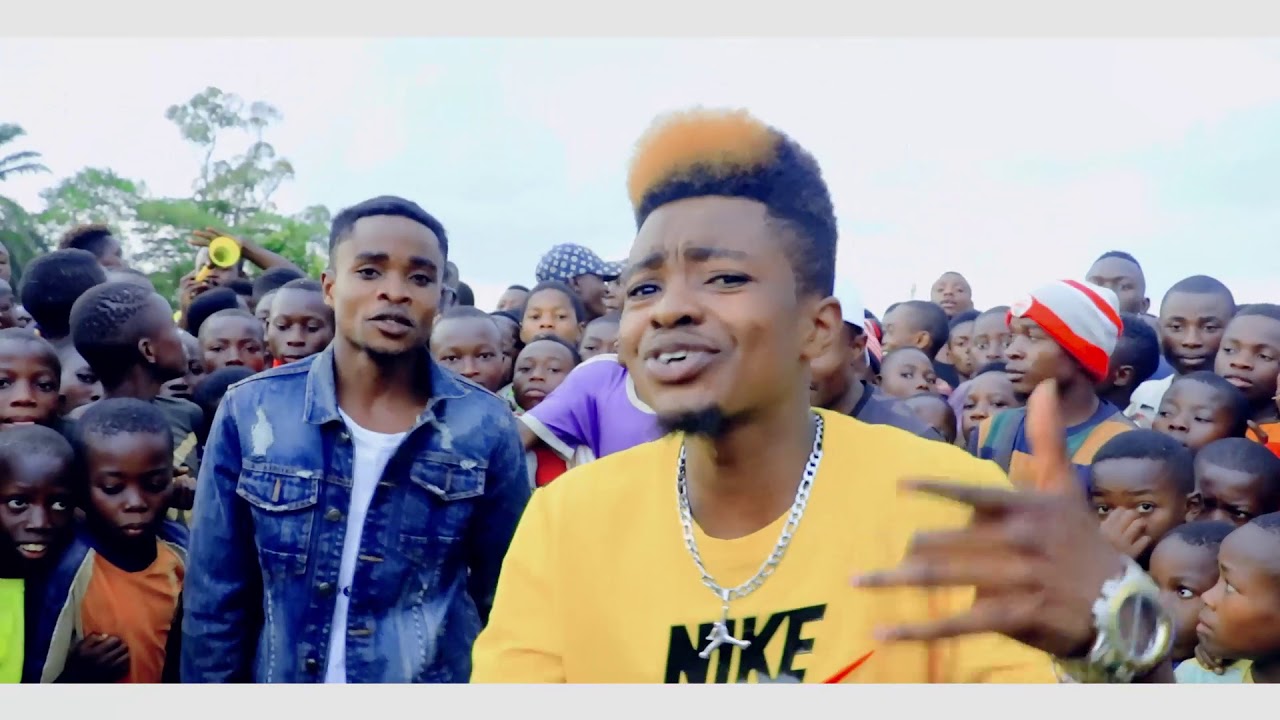 Carlos'B Ft Baraka-J -Yangu ailale njala.. (Offiel_Video).mp4