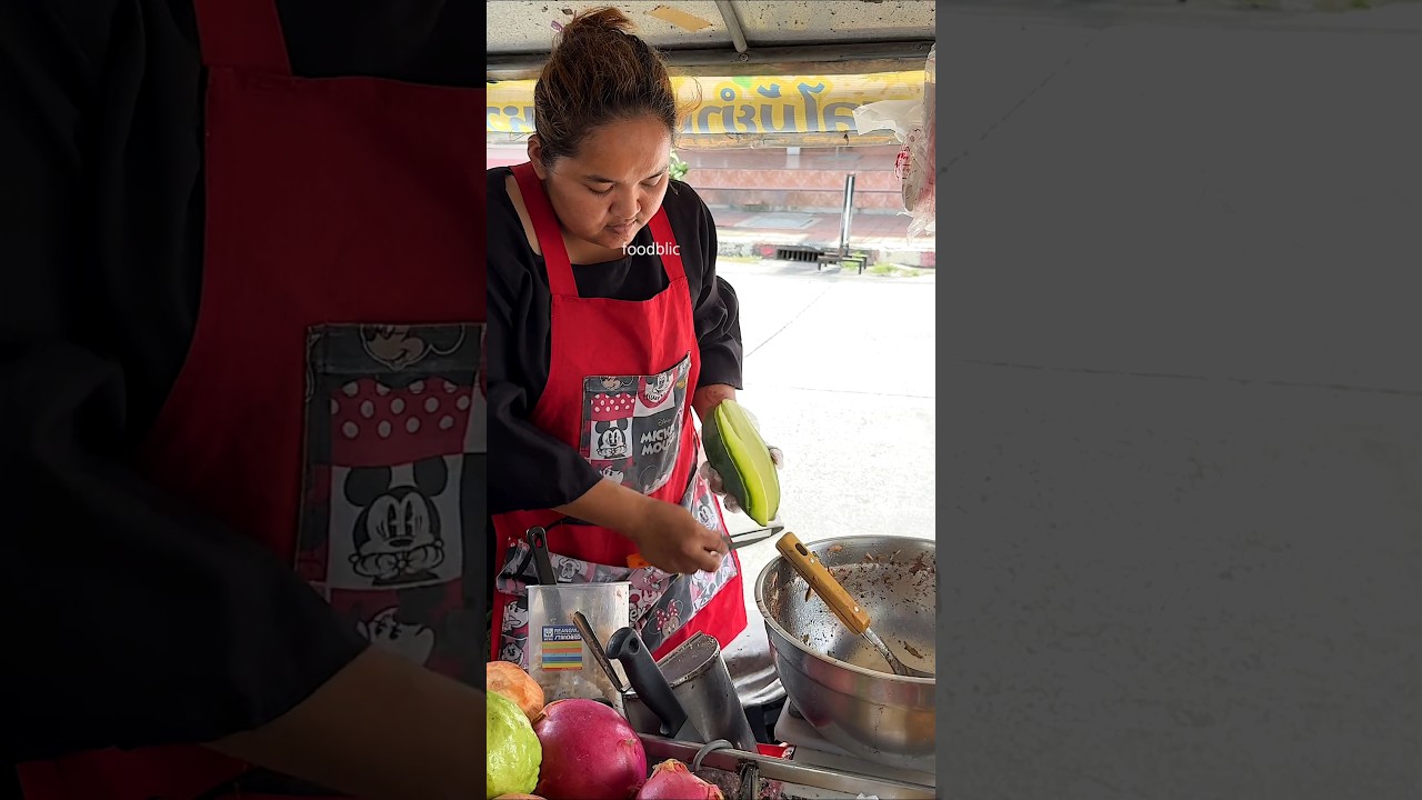 Incredible green mango cutting skill by a Thai girl