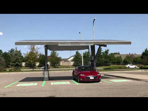 Charging my Tesla at a solar powered charging station