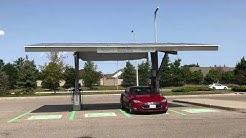 Charging my Tesla at a solar powered charging station