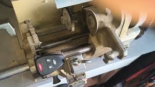 Cutting a 2 Sided Key With a Curtis Model 2000 Key Machine