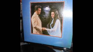 Loretta Lynn and Conway Twitty---When I Turn Off My Light (your memory turns on)
