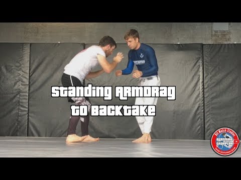 Standing Arm Drag to Back Take