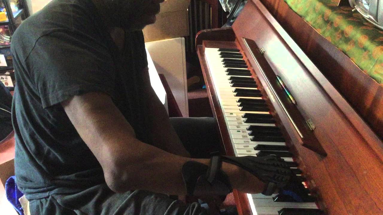 Hampshire Orthotics Saebo hand brace making it easier to play the piano