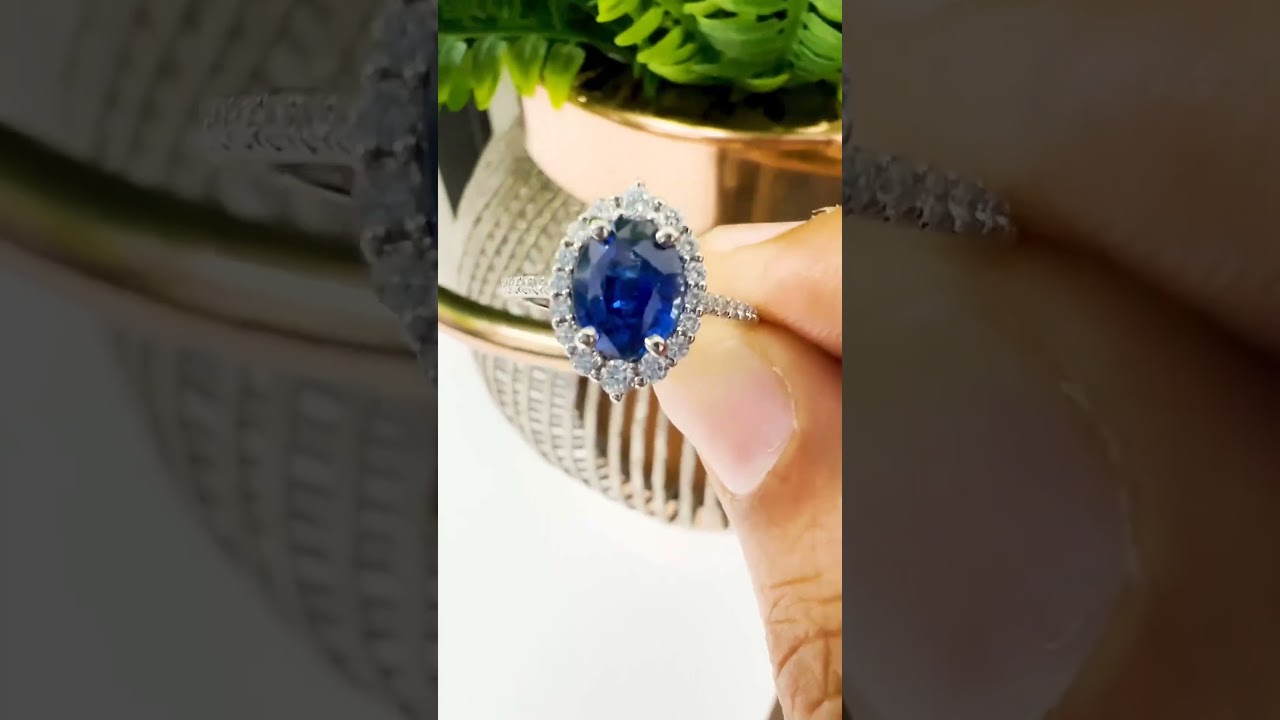 Blue Sapphire Halo Ring with Round Diamonds 