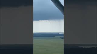Worker Films Funnel Cloud Forming From Tall Tower