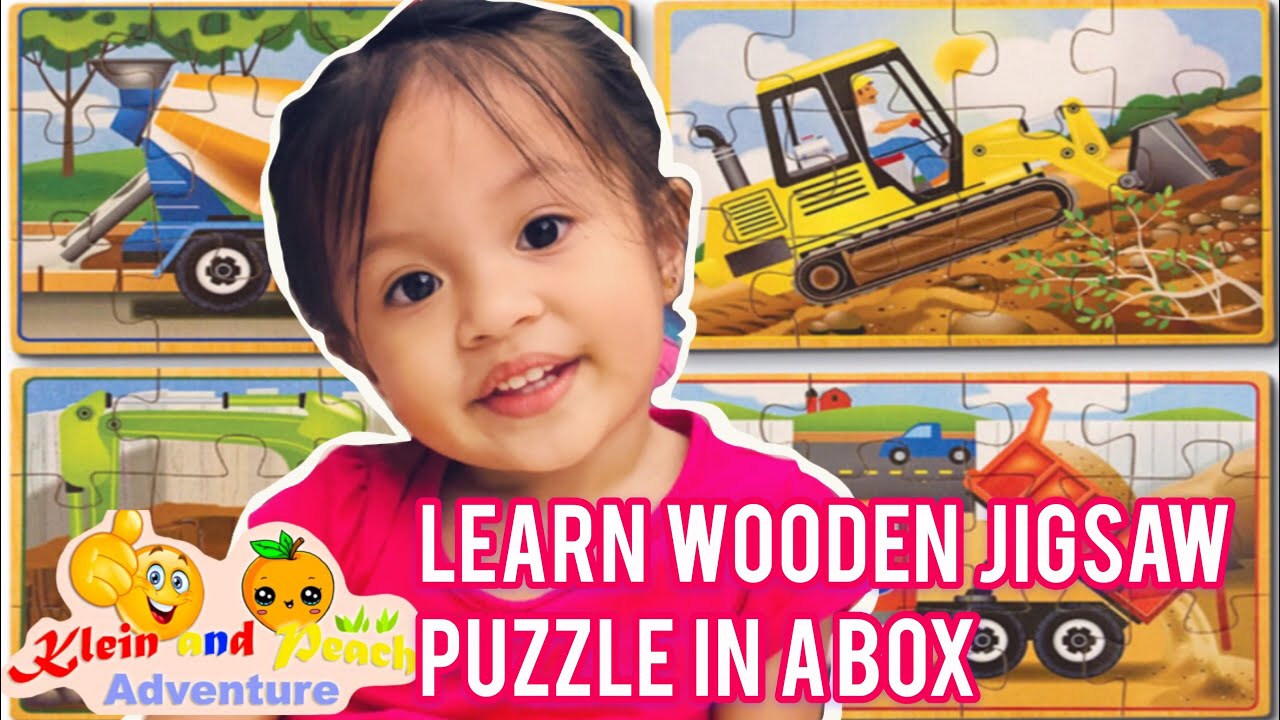 Learning how to play her wooden jigsaw kid puzzles games kids toy
