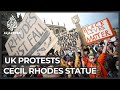 Uk oxford protesters demand cecil rhodes statue be removed