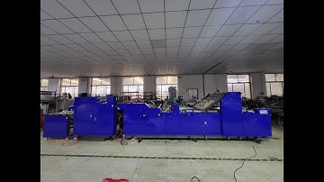 EXERCISE BOOKS&NOTE BOOKS MAKING MACHINE 1020MM COLLATING,STAPLING,FOLDING,BACK SQUEEZING,CUTTING.