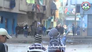 تصدي مسيرة الشرعيه  بالسويس لبلطجية حي الكويت  - 24-1-2014