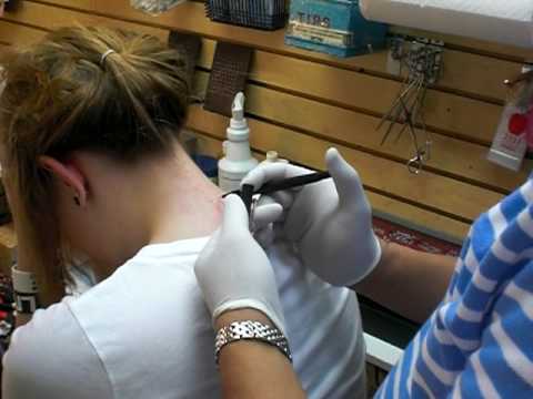 Claire Getting Her Neck Pierced!!!!