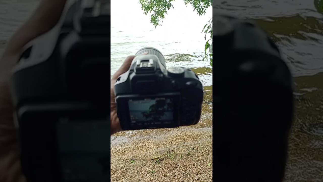 Fisherman Casting Net on a Calm Lake in 70-300mm lens. 