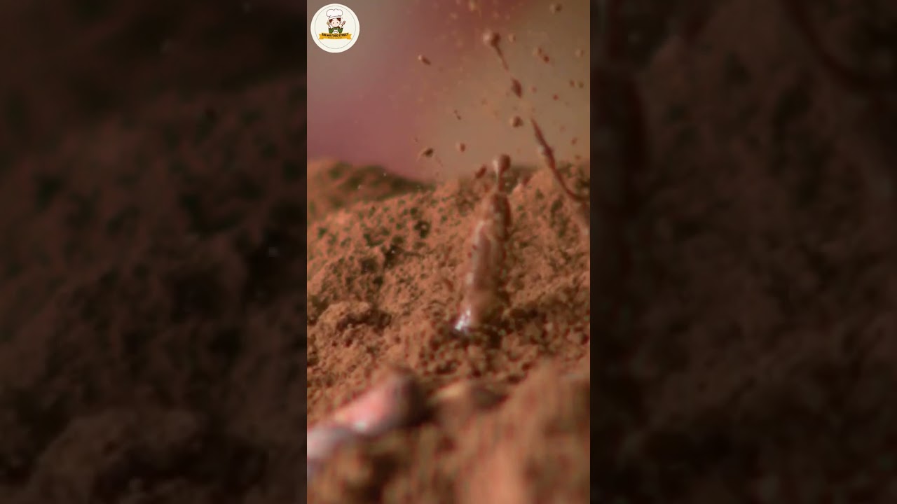 Falling cocoa beans into cocoa in super slow motion 