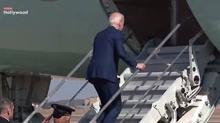 President Joe Biden nearly falls up the stairs again as he departs Washington for California