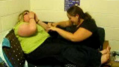 Caitlin "tickling" Alison