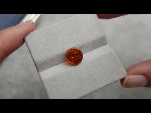 Vivid orange clinohumite 3.88 carats in round cut, Afghanistan Video  № 2