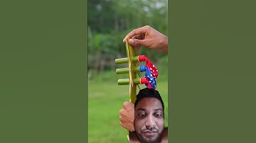 DIY bamboo creations colour balloon date palm tree slingshots #bamboocrafts #balloons #diy #hunting