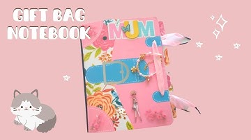 Altered Composition Notebook Using Gift Bags from the Dollar Tree