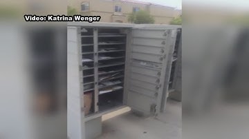 Woman catches mailboxes left open by carrier