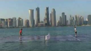 Rafael Nadal and Roger Federer play tennis on water in Doha