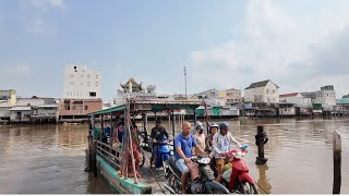 Walking the river front and taking a ferry in Lang Tron Vietnam