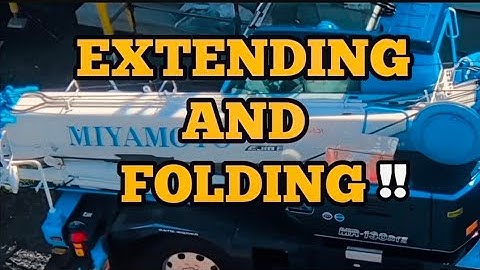 EXTENDING AND FOLDING THE BOOM OF A CRANE