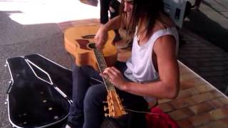 Air Tapping Busker in Byron Bay.