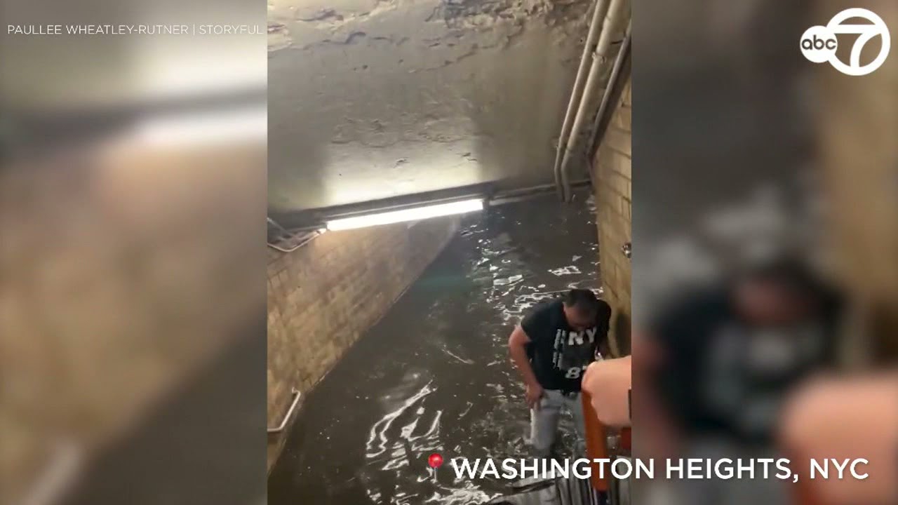 Straphangers wade through flooded NYC subway station - YouTube