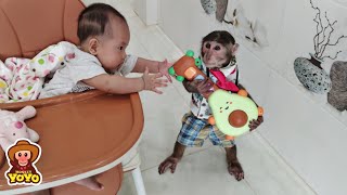YoYo JR plays the guitar