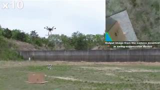 Long-Reach Aerial Manipulation Employing Wire-Suspended Hand with Swing-Suppression Device