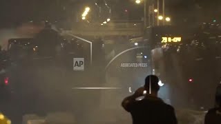 New clashes between Serbian police and protesters after mass anti-government march in Belgrade