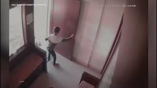 Indian Boy Calmly Exits as Leopard Enters Building