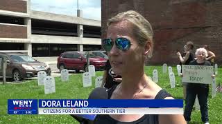 Protestors gather outside Rep Langworthy s Corning office