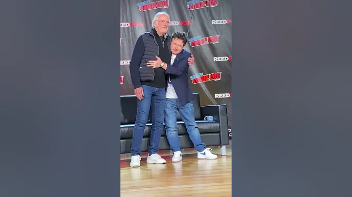 Michael J. Fox and Christopher Loyd Share Hug at C...