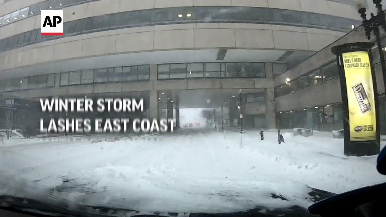 Winter storm lashes East Coast with deep snow - YouTube