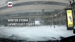 Winter storm lashes East Coast with deep snow