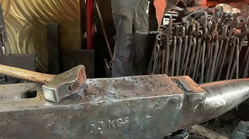 Forge welding the axe bit made from a farriers rasp