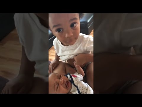 Sweet Brother Tries to Soothe Baby Sister by Breastfeeding || ViralHog