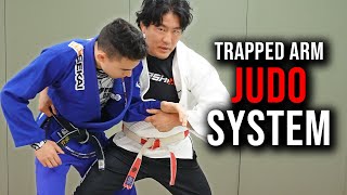 Step 1 - Trap Their Arm. Step 2 - JUDO SYSTEM