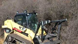 Caterpillar HM312 mulcher on the 277C CTL