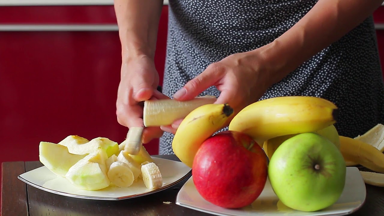 housewife cut banana for fresh smoothies useful fruit dietar